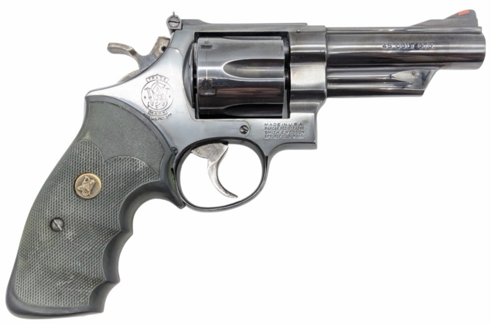 Smith & Wesson Model 25-5 .45 LC Revolver: Smith & Wesson Model 25-5 .45 LC Revolver.? The Smith & Wesson model 25-5 is in nice used condition.? Barrel measures 4 1/8 inches in length.? Revolver obtains after market rubber grips.? Blueing is s