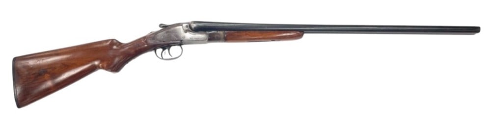 American Gun Co Knickerbocker .20 Ga Side by Side Shotgun: American Gun Co Knickerbocker .20 Ga Side by Side Shotgun.? The American Gun Co Knickerbocker .20 Ga shotgun is in used condition.? Barrels measure 26 inches in length.? Blueing is good.? Wood stock i