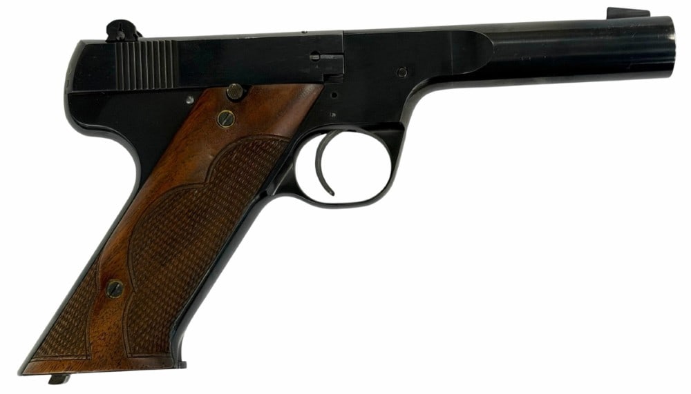 High Standard Model E .22 LR Semi Automatic Pistol: High Standard Model E .22 LR Semi Automatic Pistol.? The vintage High Standard model E is in very nice used condition.? Barrel measures 4.5 inches in length.? Blueing is strong and the bore is very cl