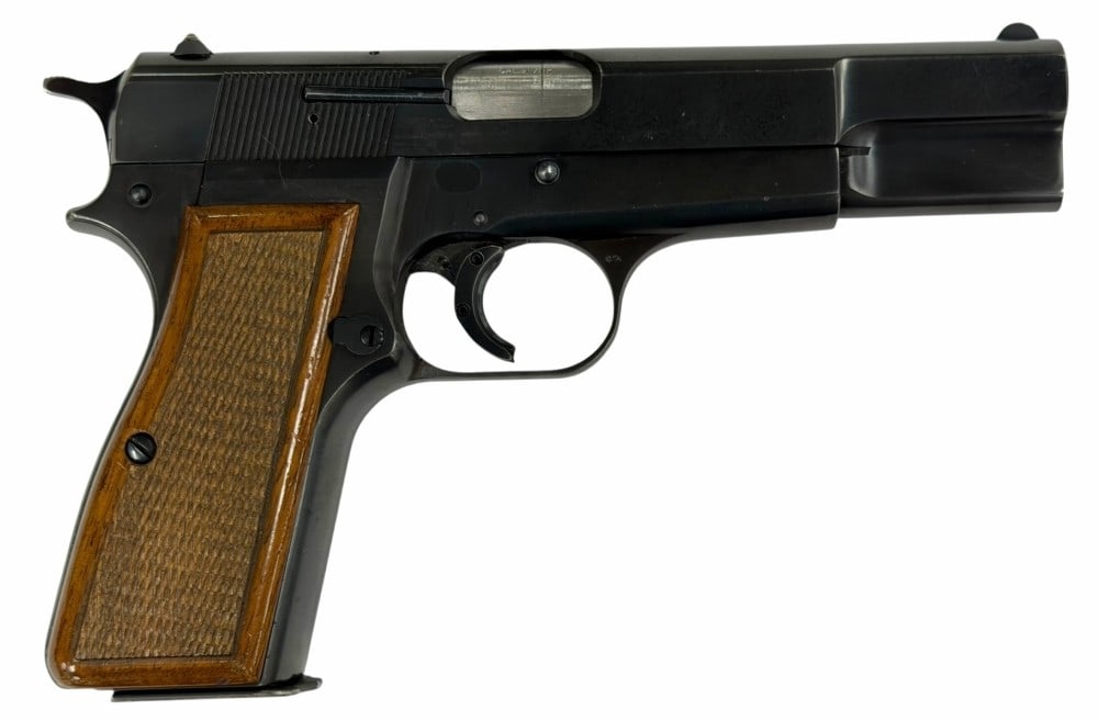 Browning Hi Power .9mm Semi-Automatic Pistol: Browning Hi Power .9mm Semi-Automatic Pistol.? The Browning Hi Power .9mm semi automatic pistol is in very nice used condition.? Barrel measures 4.5 inches in length.? Bore is extremely clean.? Bluein