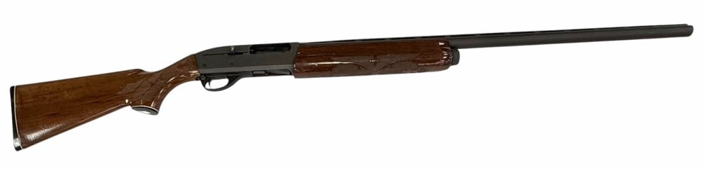 Remington Model 1100 Magnum .12 Ga Semi Automatic Shotgun: Remington Model 1100 Magnum .12 Ga Semi Automatic Shotgun.? The Remington Model 1100 .12 Ga semi automatic shotgun is in nice used condition.? The vented barrel measures 30 inches in length.? Shotgun 