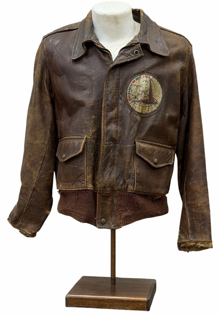 Authentic Brown Leather WWII Flight Jacket: Authentic Brown Leather WWII Flight Jacket. This is a Authentic Brown Leather WWII Flight Jacket that features a Air Transport Command patch on the left chest side of the jacket. This is a very rare f