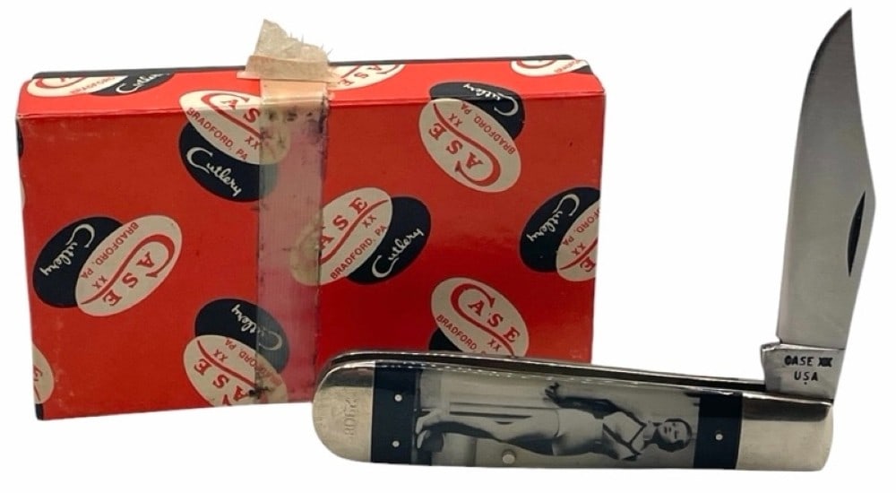 1979 Case XX HA1991/2 SSP Folding Pocket Knife: 1979 Case XX HA199 1/2 SSP Folding Pocket Knife. The HA1991/2 SSP Folding Pocket Knife is very nice like new condition.? The semi-clear synthetic celluloid handle houses a "Bathing Beauty" graphic und