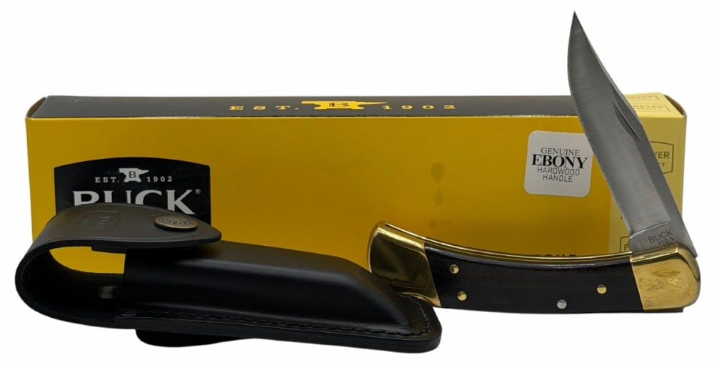 2025 Buck 110 Folding Hunter Knife 9210 with Ebony Handle, Leather Sheath in Box: 2025 Buck 110 Folding Hunter Knife 9210 with Ebony Handle, Leather Sheath in Box.? This knife is in like new condition, The 110 Folding Hunter knife is a classic and traditional favorite. The knife fe