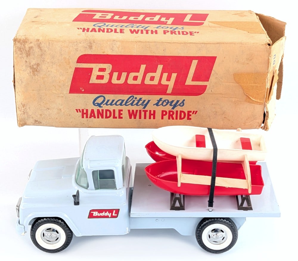 Buddy L No. 5406 Double Deck Boat Transport Truck w/ Box: Buddy L No. 5406 double deck boat transport truck with original box. The transport rack holding the top boat is not original. The truck is original paint showing only minor rub marks and light wear. A