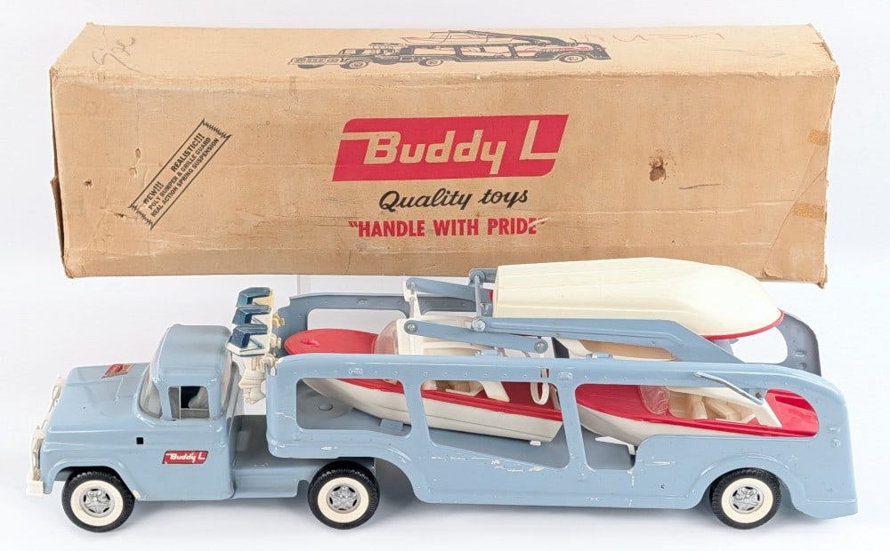 Buddy L No. 5466 Self Loading Boat Hauler Truck w/ Box: Original Buddy L No. 5466 self loading boat hauler truck and trailer with original box. The truck comes with three boats and three outboard motors. The truck shows some rub marks / scratches primarily