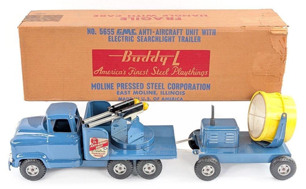 Buddy L No. 5655 GMC Anti-Aircraft w/ Searchlight w/ Box: Original Buddy L No. 5655 GMC Anti-Aircraft unit with Searchlight trailer in the original box. The truck and searchlight trailer have some rub marks and minor paint loss / scratches. The box is missin