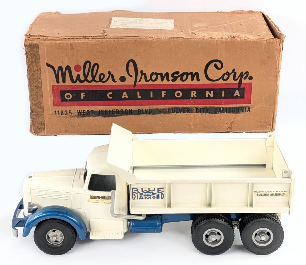 Smith Miller Blue Diamond Hydraulic Dump Truck w/ Box: Smith Miller Blue Diamond hydraulic dump truck with original box. The hydraulic dump works. The two small flaps on the inside of the box are loose. The box ends are marked Coca-Cola and hydraulic dump