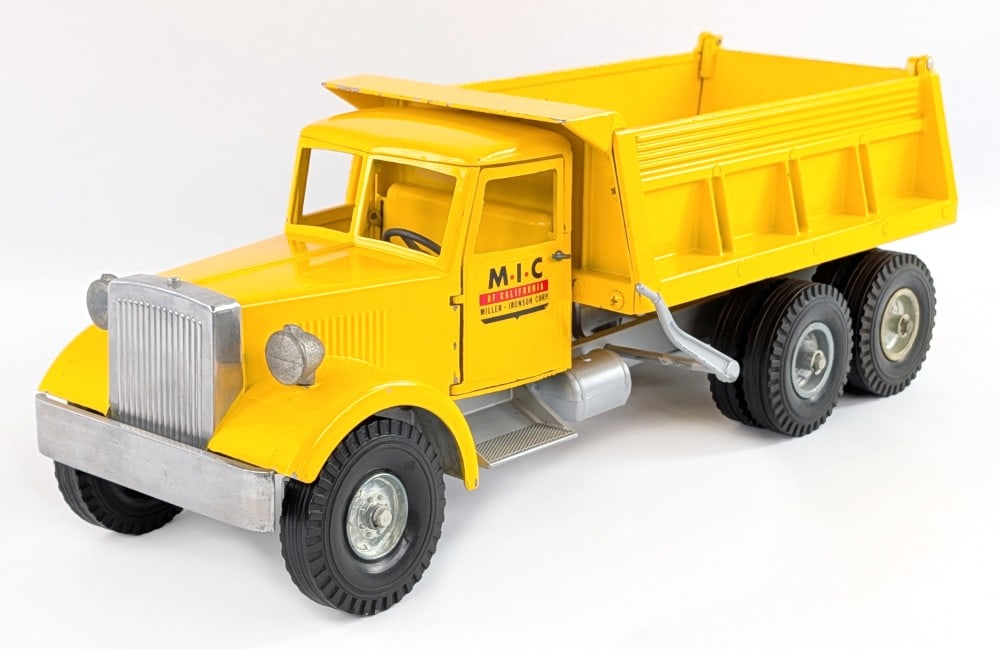 Smith Miller MIC Hydraulic Dump Truck Prototype: Smith Miller MIC hydraulic dump truck. The truck is believed to be a prototype with painted frame. It comes with a foam lined box. The truck has some scattered paint chips, but overall is in very
