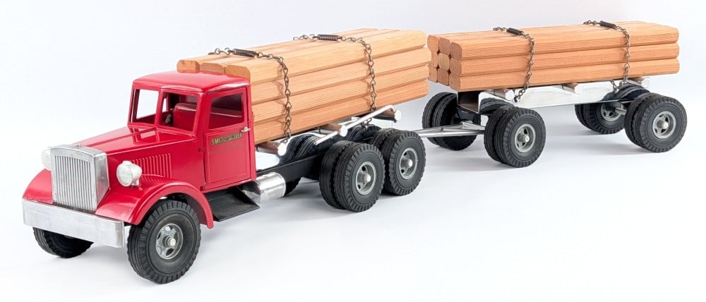 Fred Thompson Smith Miller MIC Lumber Truck with Trailer: Fred Thompson Smith Miller MIC lumber hauler truck with trailer. This is believed to be the first series of trucks Fred built. This one is serial number 77 of 100. Displays well with red painted cab w