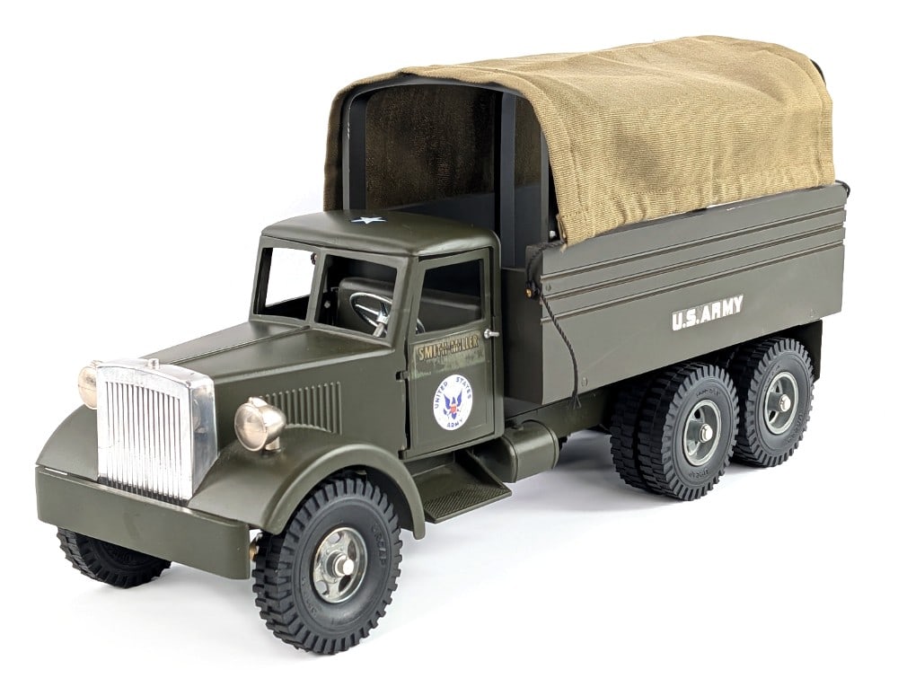 Fred Thompson Smith Miller U.S. Army Transport Truck: Fred Thompson Smith Miller MIC style U.S. Army transport truck. Displays well with canvas tarped bed, MIC style cab with functioning doors, and U.S. Army decals. The truck is missing one of the door h