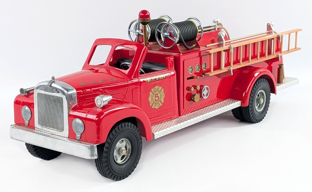 Fred Thompson Smith Miller B Mack No. 5 Fire Truck - Red: Fred Thompson Smith Miller B Mack No. 5 fire truck. Open cab in red variation. Excellent condition overall. Displays well with wood ladder, hoses, siren, and great detail. It comes with a foam lined b