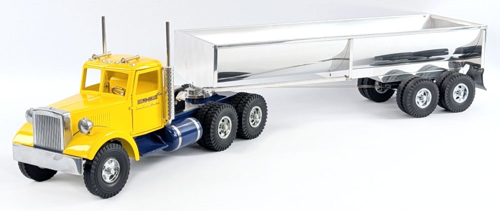 Fred Thompson Smith Miller MIC Truck w/ Dump Trailer: Fred Thompson Smith Miller MIC style truck with dump trailer. Displays very well with chrome trailer that dumps with the crank, functioning doors on the cab, and realistic detail. The rear mudflaps ha