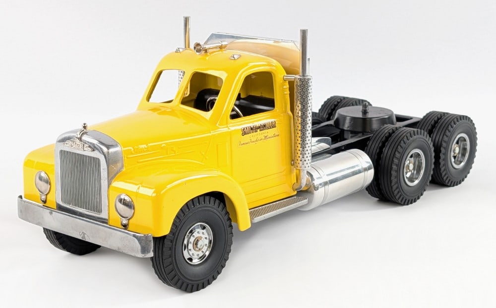 Custom Smith Miller B Mack Semi Truck: Custom Smith Miller B Mack semi truck cab. The truck has a couple tiny paint chips on the fenders and scratches to the fifth wheel, but otherwise is in good condition. Displays well overall painted in
