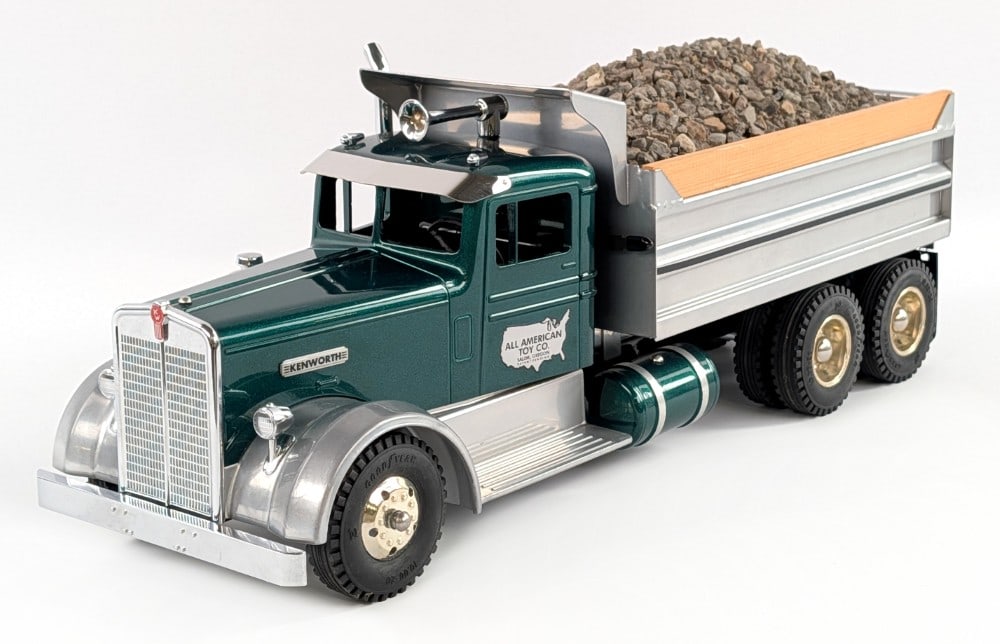 All American Kenworth Hydraulic Dump Truck: All American Kenworth hydraulic dump truck. The truck has a custom gravel / stone load. The siren on the cab steers the front wheels. The hydraulic dump needs some assistance in order to work. Display