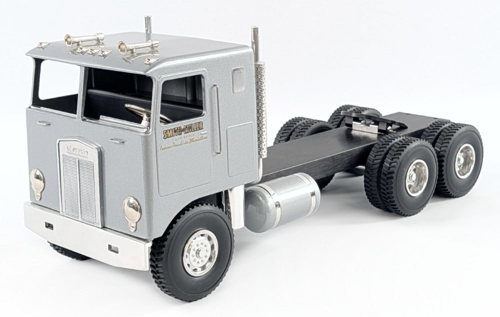 Custom Smith Miller Kenworth Cabover Semi Truck: Custom Smith Miller Kenworth cabover semi truck. Displays very well with chrome features, custom wheels, and stretched frame. Excellent condition overall. Measures approximately 17-1/2" long.