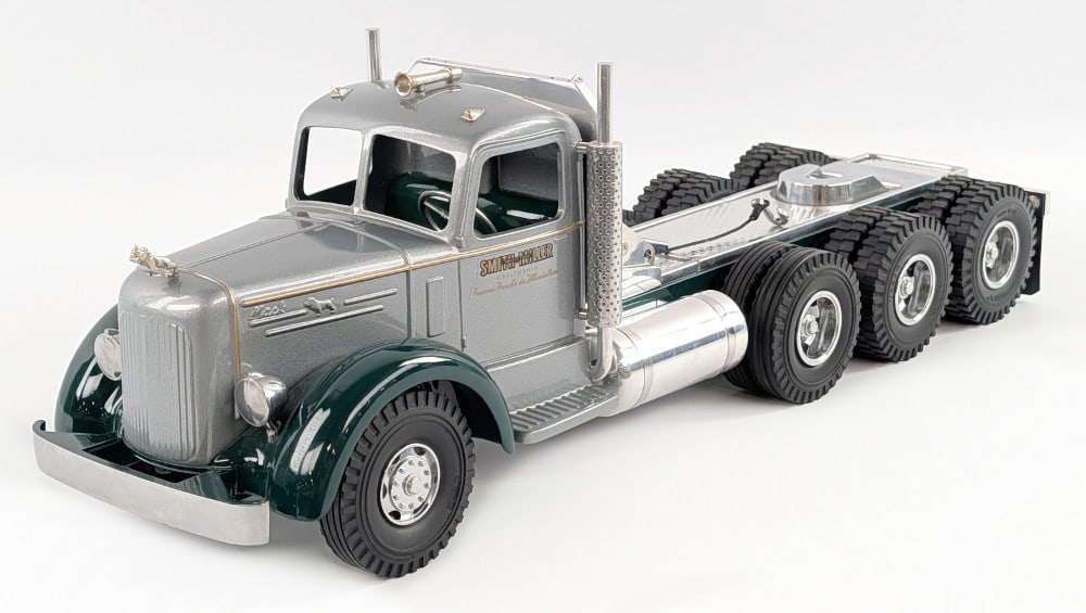 Custom Smith Miller L Mack Tri-Axle Semi Truck: Custom Smith Miller L Mack tri-axle semi truck with winch. Displays extremely well with chrome wheels, winch, reflectors, bulldog hood ornament, and great detail. Excellent condition. A nice quality