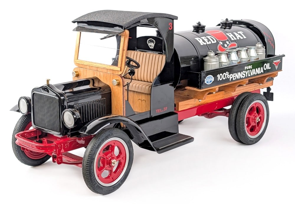 King K Custom Red Hat Oil Tanker Truck: Outstanding King K custom built Red Hat Pure Pennsylvania Red Hat Oil tanker truck. The truck is a "White" truck with Buddy L oil cans, Red Hat decals, rubber tires, and outstanding detail. The truck