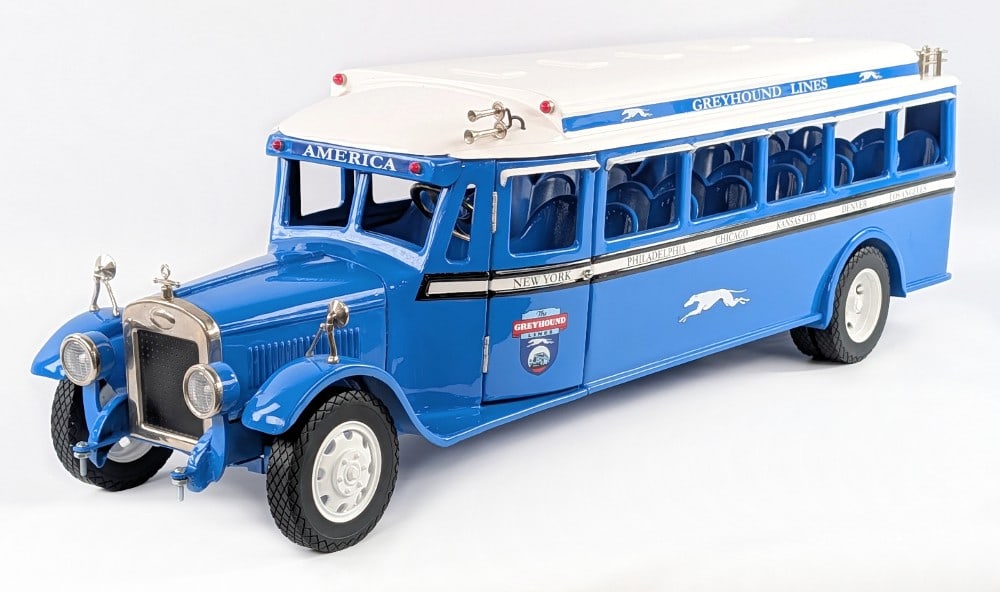 Retro 123 Greyhound Lines Motorcoach Bus: Retro 1-2-3 Greyhound Lines motorcoach bus. The bus is in very good condition overall, however it is missing the front bumper. The doors on the bus open. Displays well with Greyhound Lines graphics