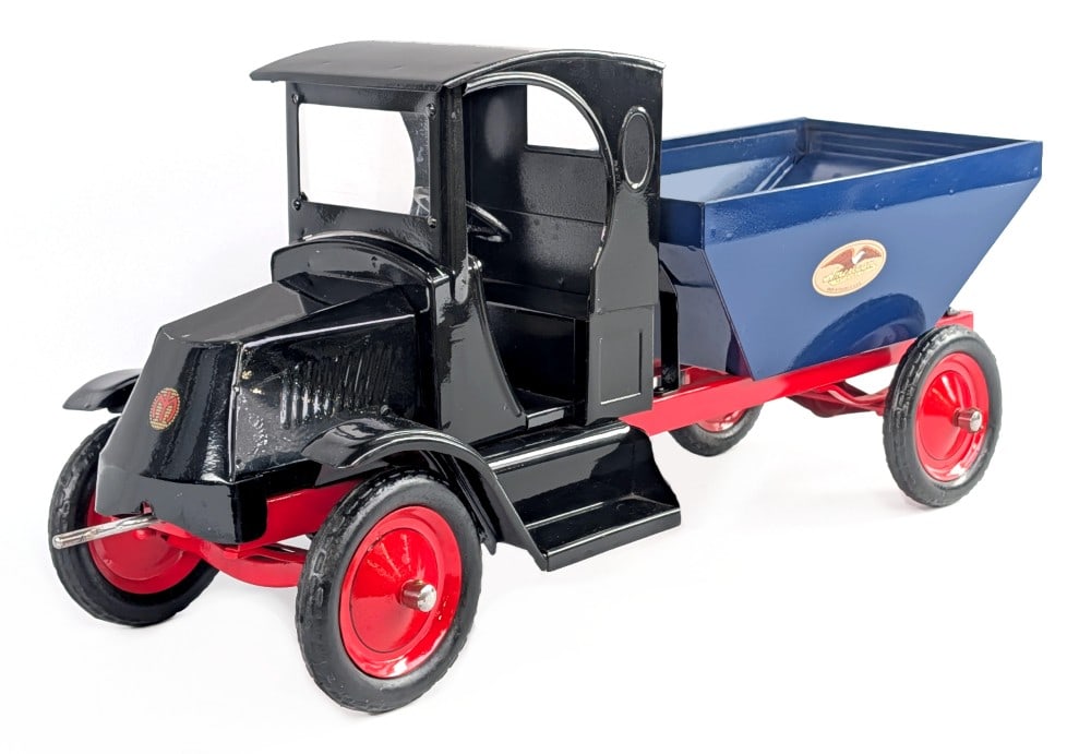 Restored American National Mack Coal Truck: Restored American National Mack coal truck. The truck has a very nice restoration overall with black cab, blue coal bed, red frame, red tires, and rubber wheels. Very Good condition. Measures approxim