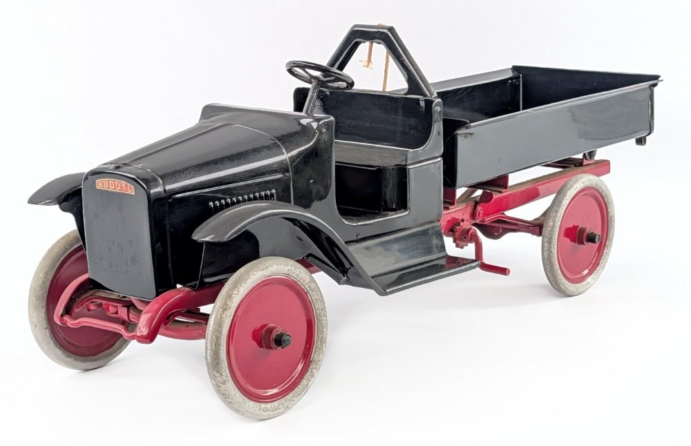 Restored Buddy L "A" Frame Dump Truck: Restored Buddy L "A" frame dump truck. The truck has a very nice restoration, but could use a good polishing. The string broke, so that needs repaired in order for the dump bed to work. Measures appro