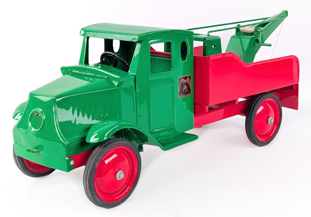 Custom Steelcraft Mack Wrecker Tow Truck: Custom Steelcraft Mack wrecker tow truck. The truck has a very nice custom job. It is missing the Mack decal on the front of the hood and a couple tires have flat spots. Very good condition and displa