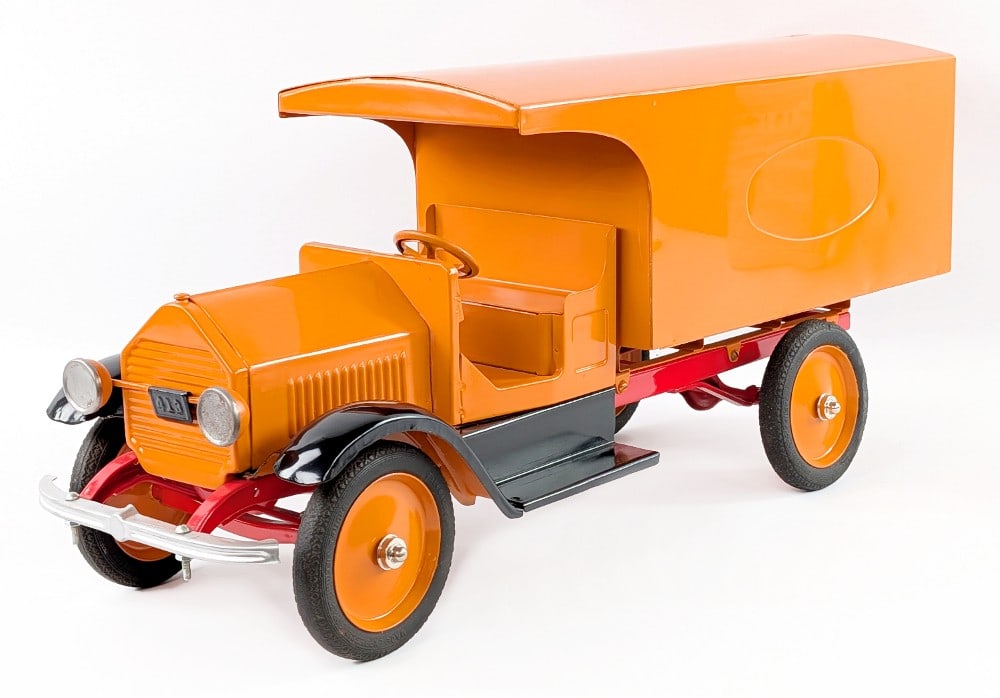 Sturditoy Traveling Store Delivery Truck: Sturditoy traveling store delivering truck. The truck has a decent paint job overall. It does have a couple ding's on the roof of the bed. It has the rear doors that open, headlights, and license plat