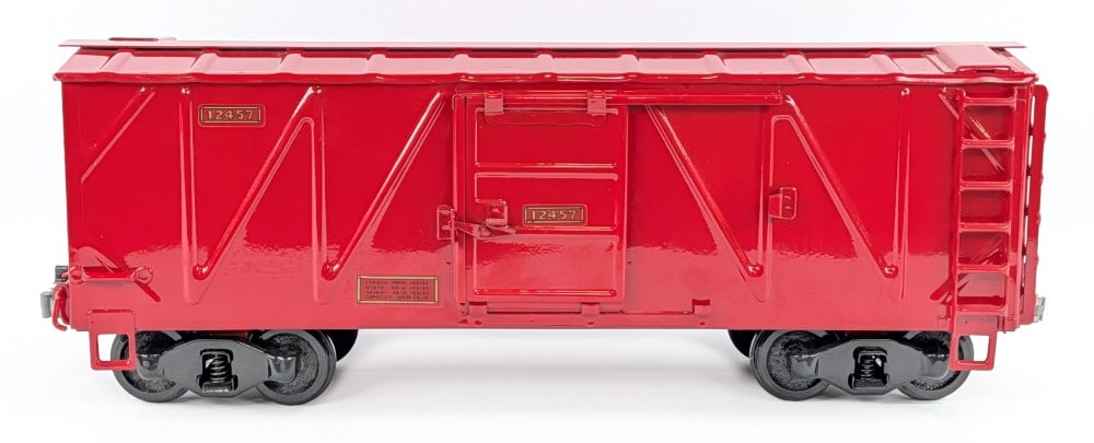 T-Reproductions Buddy L Outdoor Railroad Box Car: T-Reproductions Buddy L Outdoor Railroad #12457 red boxcar. The one coupler is starting to crack, but otherwise in excellent condition. Measures approximately 22" long.