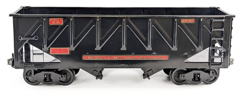 T-Reproduction Buddy L Outdoor Railroad #68502 Coal Hopper Car: T-Reproduction Buddy L Outdoor Railroad #68502 coal hopper car. One of the couplers is starting to crack. Very good condition with bottom dump. Measures approximately 22" long.