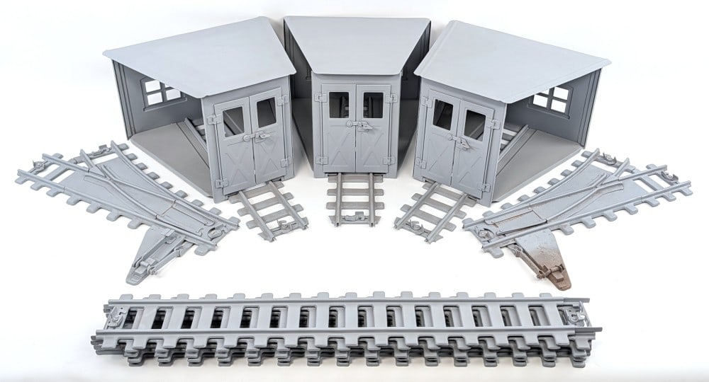 Buddy L Industrial Railroad Roundhouse Set with Track: Buddy L Industrial Railroad Roundhouse with track. Includes 3-stall roundhouse, left & right track switches, and five pieces of straight track. All were stripped and primed ready for restoration. The 