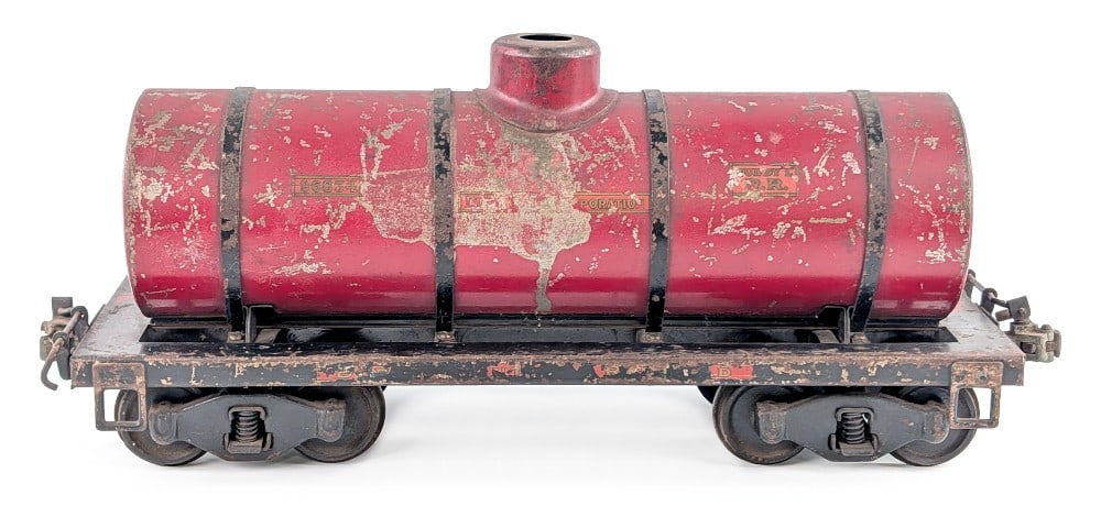Original Buddy L Outdoor Railroad Red Tank Car: Original Buddy L Outdoor Railroad red tank car #96834. The car is missing the tank lid. It shows paint loss, surface rust, and decal loss from age. Measures approximately 19" long.