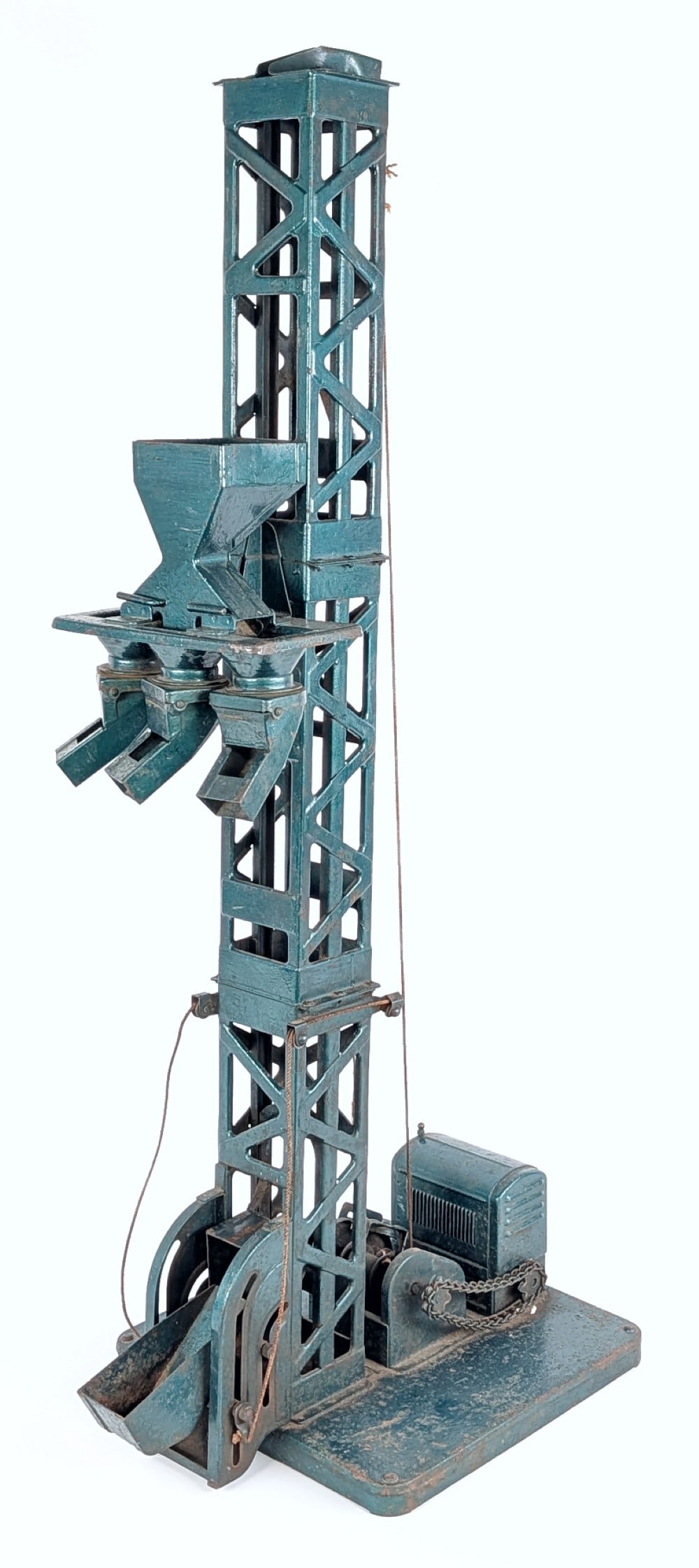 Buddy L Hoisting Tower: Buddy L hoisting tower. The tower has an old amateur overpaint. It is missing the chutes and needs some attention in order to work. It has surface rust and wear from age. Measures approximately 38" ta