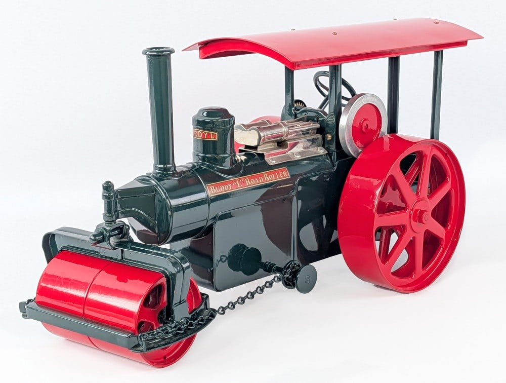 Restored Buddy L Road Roller: Professional restored Buddy L road roller. The roller has a appealing high quality restoration. Excellent condition with a couple tiny marks. A very desirable Buddy L toy. Measures approximately 18" l