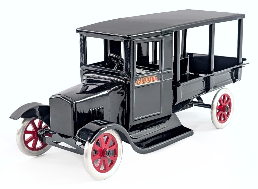 Buddy L Ford Flivver Huckster Truck: Buddy L Ford Flivver huckster truck. Either a high quality restoration or a nice reproduction. Not really any signs of pitting or age. Displays very well. Very good condition with some dust from displ