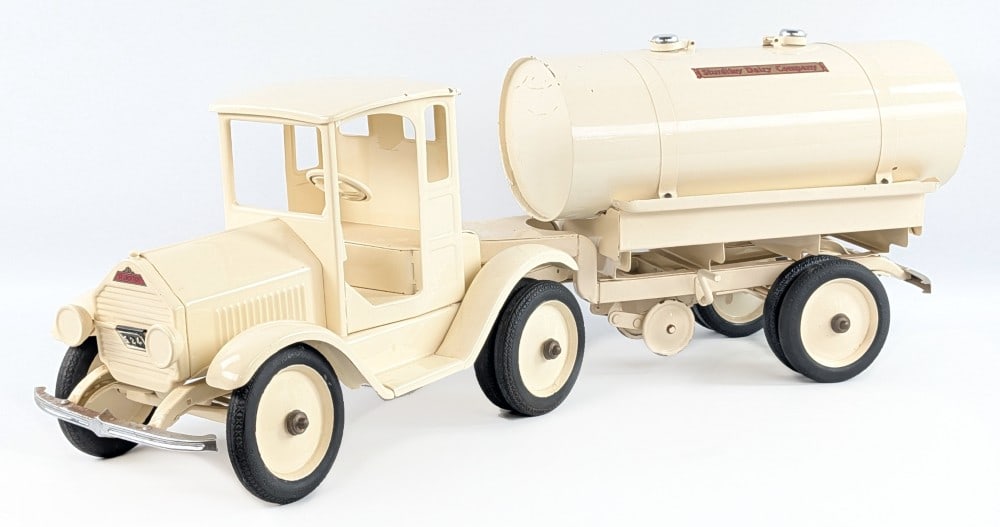Restored Sturditoy Dairy Company Tanker Truck & Trailer: Restored Sturditoy Dairy Company tanker truck and trailer. The truck has a good restoration, but does show some paint chips, scuff marks, and minor surface rust to the bumpers. Still displays well ove