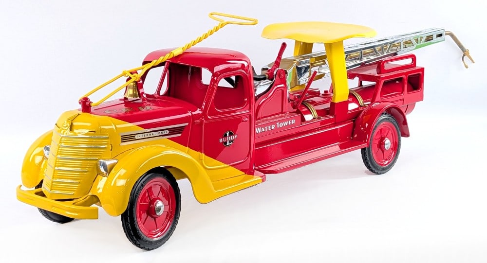 Restored 1938 Buddy L Water Tower Fire Truck: Restored 1938 Buddy L International water tower fire truck. The truck has a very nice professional restoration. Excellent condition with minor dust from display and a small chip on the seat. A very im
