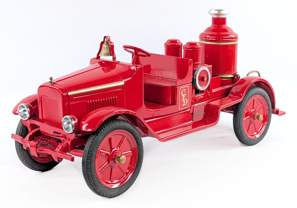 Restored Buddy L Pressurized Pumper Fire Truck with Rubber Tires: Restored Buddy L pressurized pumper fire truck with rubber tires. A professional restoration with some replacement parts. Very good condition overall. Measures approximately 24" long.? *From the Gene 