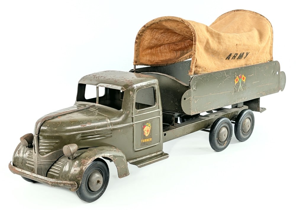 Turner Army Transport Truck: Turner U.S. Army Signal Corps transport truck. Original condition showing paint loss, surface rust, and wear from play / age. Measures approximately 24" long. *From the Gene Griser Collection*