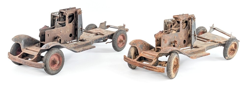 Buddy L Robotoy Dump Truck Parts: Buddy L Robotoy dump truck parts. The trucks are missing the transformers, dump beds, and cabs. Showing rust, paint loss, bent parts, and wear from age. Selling as is. Each measures approximatley 19" 