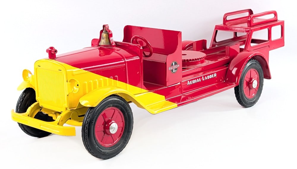 Buddy L Ride On Aerial Ladder Fire Truck Parts: Buddy L ride on aerial ladder fire truck parts. The truck is missing the aerial ladder, seat, and handle. It does have a very nice paint job overall. Measures approximately 30" long. *From the Gene Gr