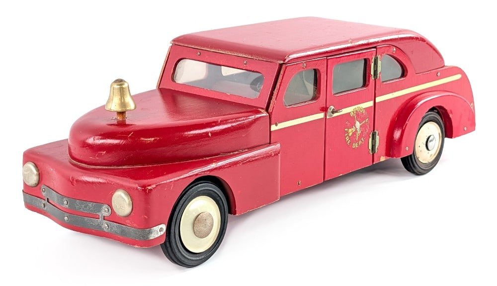 Buddy L Wood Toys Fire Chief Car with Siren: Buddy L Wood Toys Fire Chief Car with friction drive siren. The car shows some paint loss and wear from play and age. Overall in very good condition and is a hard to find Buddy L wood toy. Measures ap