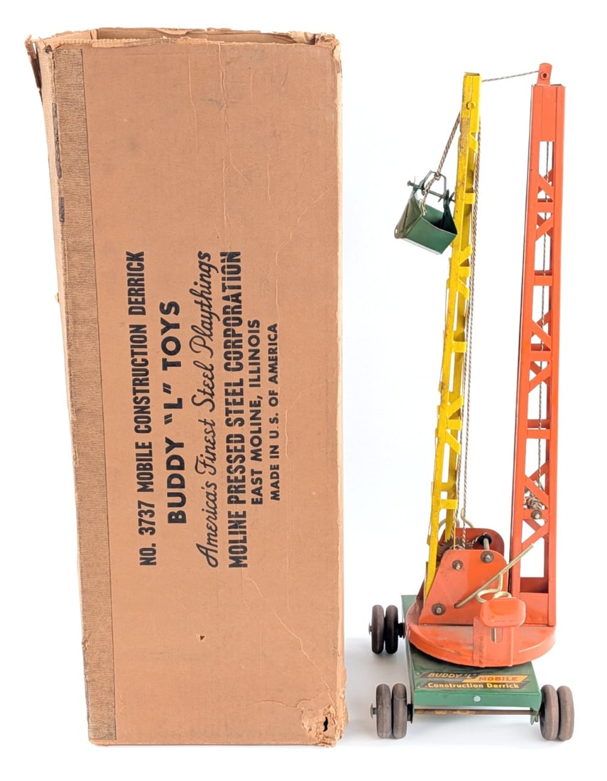 Buddy L Mobile Construction Derrick: Buddy L Mobile Construction Derrick with original box. The box is in rough condition missing end flaps and has damage to the one end. The bucket on the crane is bent. The derrick crane will clean up n