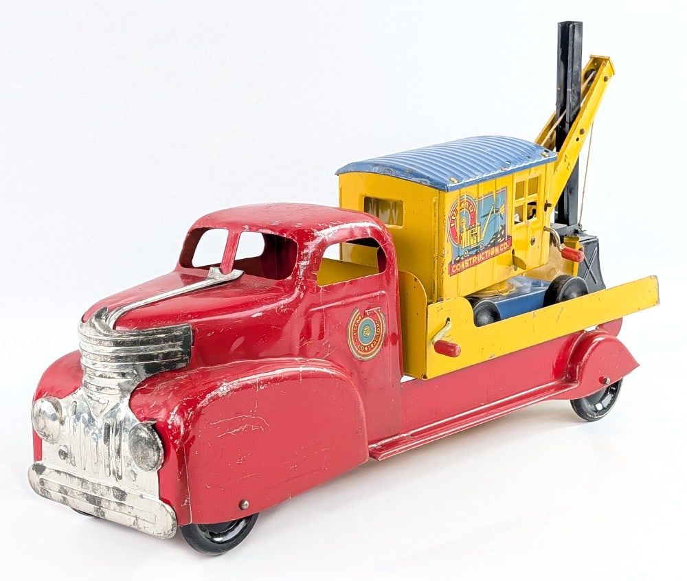 Marx Lumar Contractors Construction Co. Truck with Steam Shovel: Original Marx Lumar Contractors Construction Co. flatbed truck with steam shovel. The truck is missing the ramps, but otherwise appears to be complete. The truck and shovel show some paint loss and we