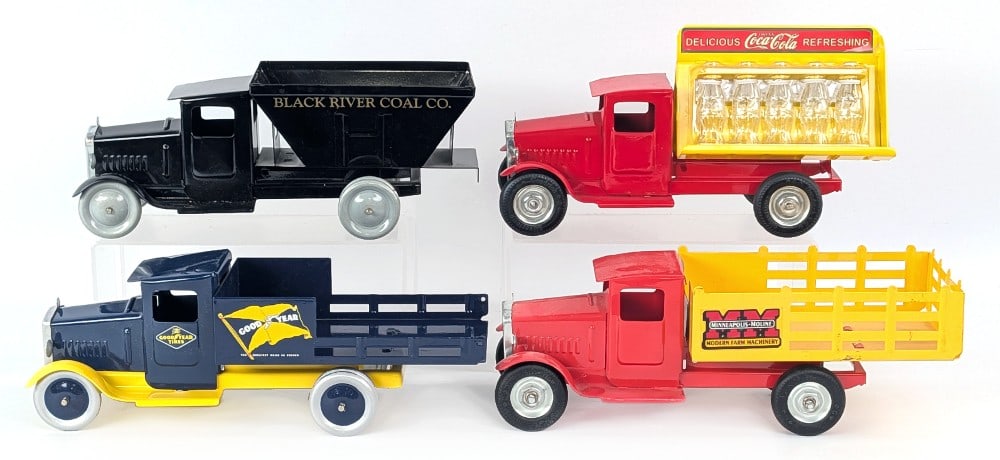 SpecCast & Gearbox Metalcraft Style Reproduction Trucks: SpecCast & Gearbox Metalcraft style reproduction trucks. Includes a Coca-Cola bottle delivery, Black River Coal Co., GoodYear, and Minneapolis-Moline. The trucks are dusty from being? on display. The 