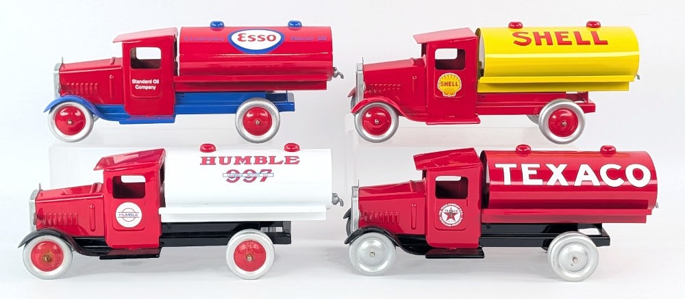SpecCast Metalcraft Style Reproduction Tanker Trucks: SpecCast Metalcraft style reproduction trucks. Includes an Esso tanker, Shell tanker, Texaco tanker, and Humble tanker truck. Some have dust and wear from display / storage. The trucks are
