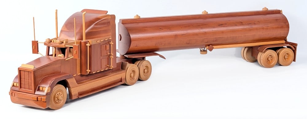 Custom Wood Toy Freighliner Semi Truck with Tanker Trailer: Large custom wood toy Freightliner semi truck with tanker trailer. A nice highly detailed custom replica. Good condition and displays well overall. Measures approximately 43" long.