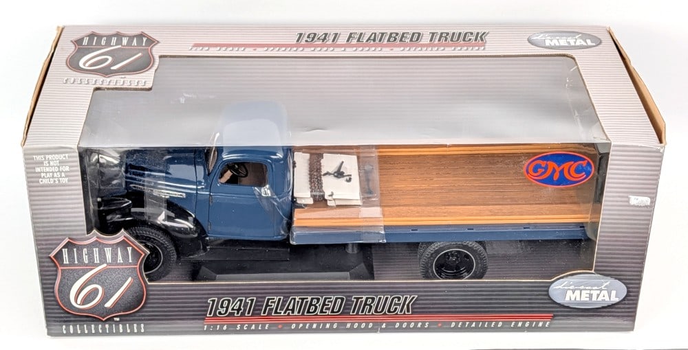 1/16 Highway 61 1941 GMC Flatbed Truck: 1/16 Scale Die-Cast Metal GMC flatbed truck. Good condition in the box and highly detailed. The box shows some wear from storage / handling.?