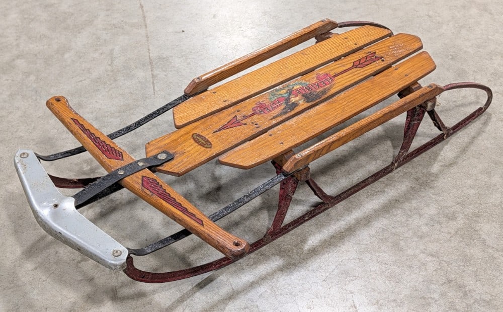 Antique Flexible Flyer Sled: Original antique flexible flyer sled. Original condition with great graphics and alligatoring to the original paint. Measures approximately 37" long.