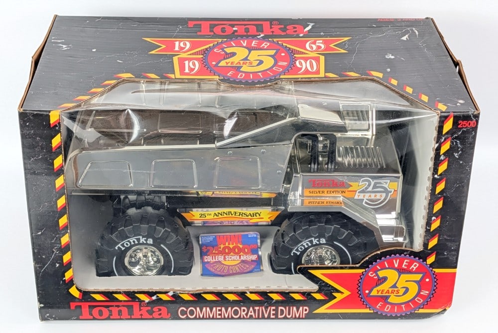 1990 Tonka 25th Anniversary Silver Edition Dump Truck - Sealed: 1990 Tonka 25th Anniversary Commemorative Silver Edition Mighty dump truck. The truck is in great condition / new in the box. The box is still factory sealed. The box does show some peeling and wear f