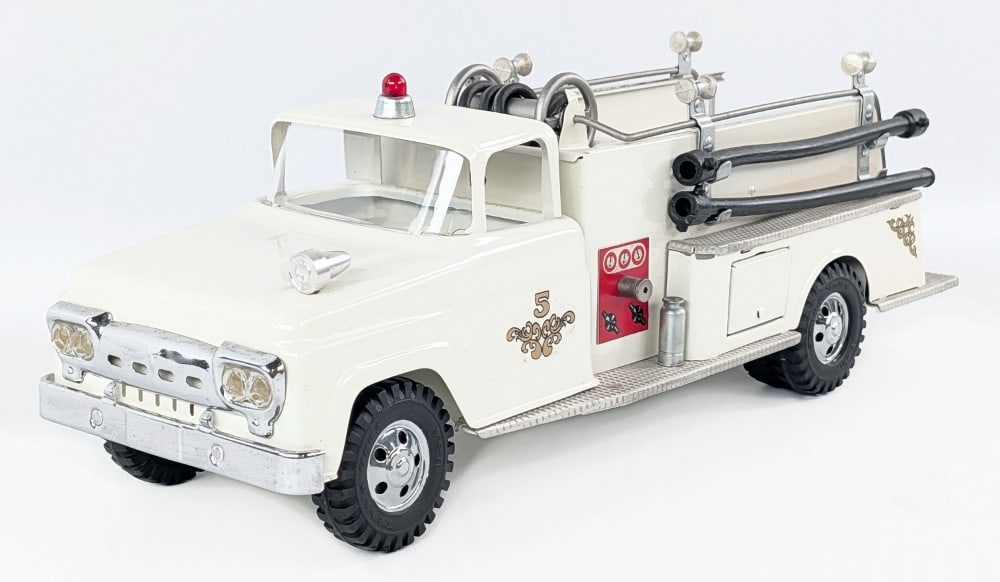 Restored White Tonka Suburban Pumper No. 5 Fire Truck: Restored white Tonka square fender suburban pumper No. 5 fire truck. The truck has a very nice professional restoration. It comes with both hoses and the ladder. The truck has some dust and light wear